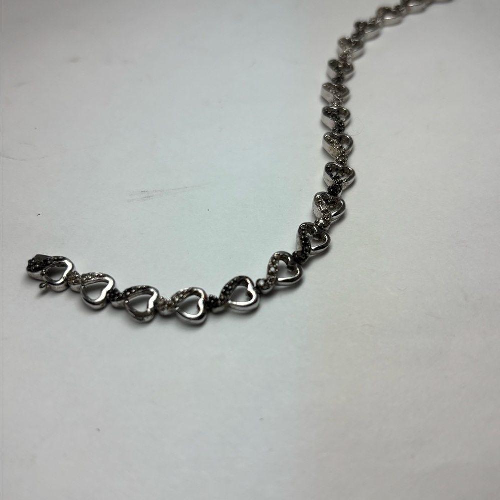 Silver Heart black and white diamond.5 Carat Bracelet stamped 925 silver 7.25”